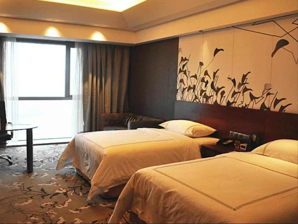 Bed in Grand Skylight International Hotel Gongqingcheng