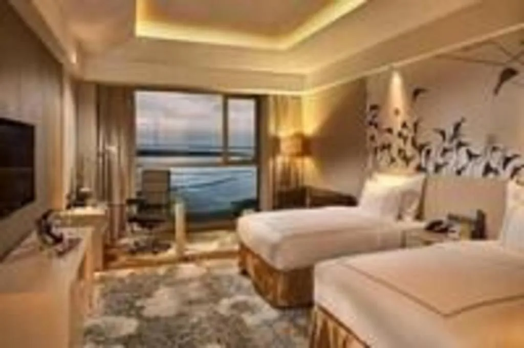 Bed in Grand Skylight International Hotel Gongqingcheng