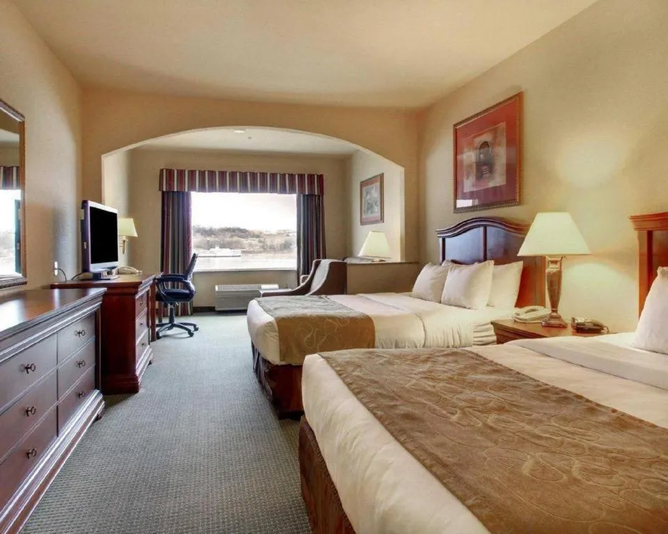 Bed in Clarion Suites Vidalia Riverfront