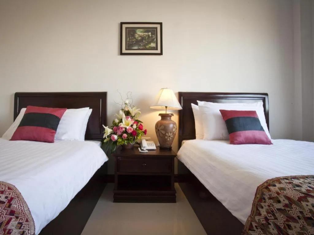 Bed in Lao Golden Hotel