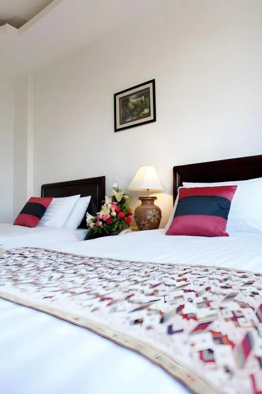 Bed in Lao Golden Hotel