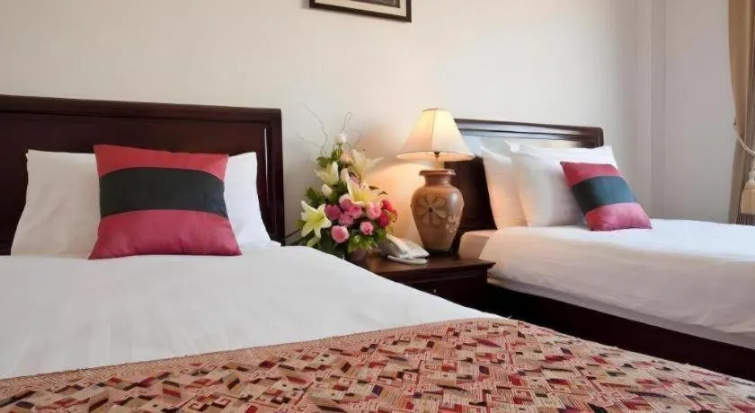 Bed in Lao Golden Hotel