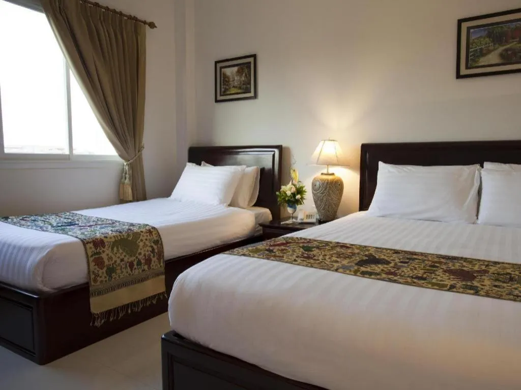 Bed in Lao Golden Hotel