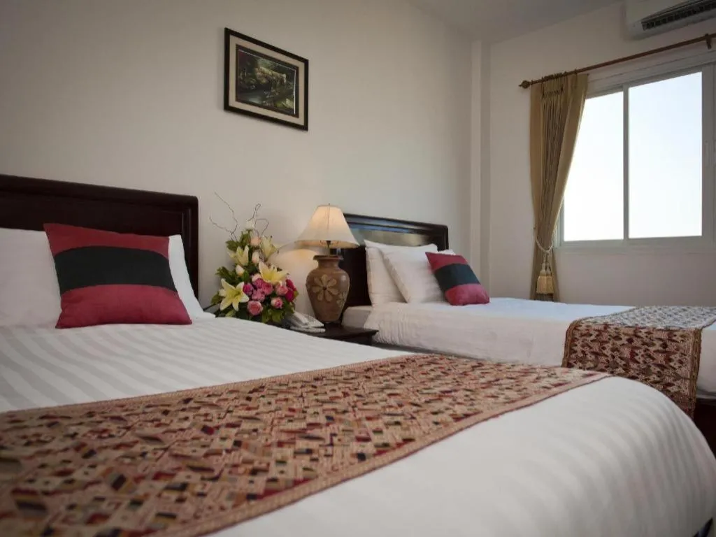 Bed in Lao Golden Hotel