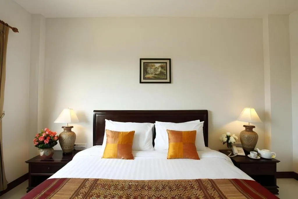 Bed in Lao Golden Hotel