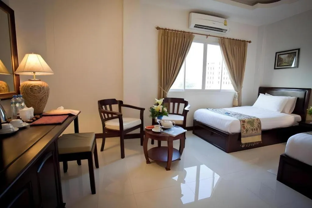 Bed in Lao Golden Hotel