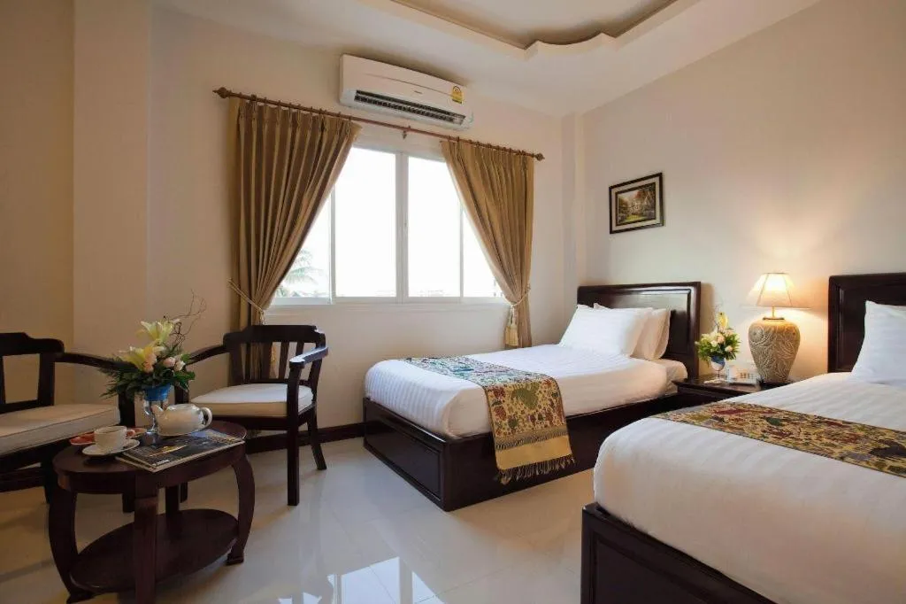 Bed in Lao Golden Hotel