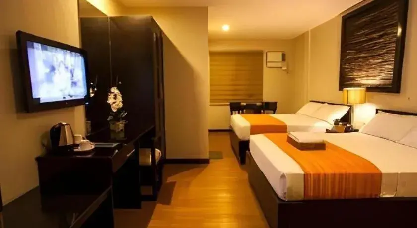 Bed in L Square Hotel Bed in L Square Hotel