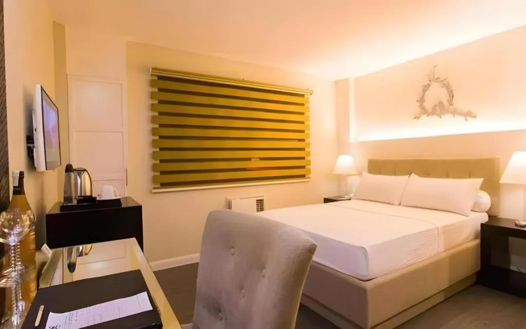 Bed in L Square Hotel