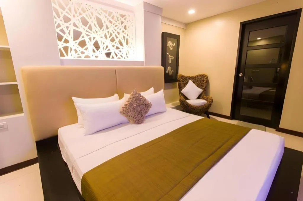 Bed in L Square Hotel