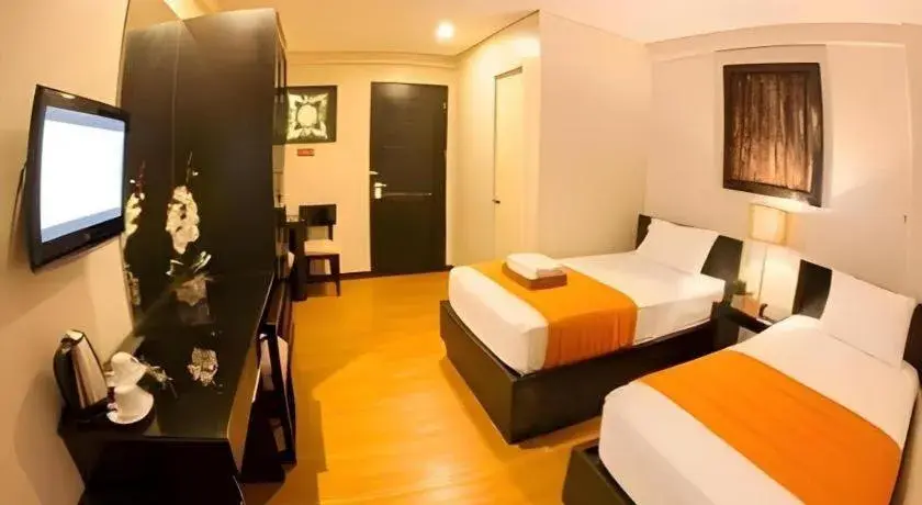 Bed in L Square Hotel Bed in L Square Hotel