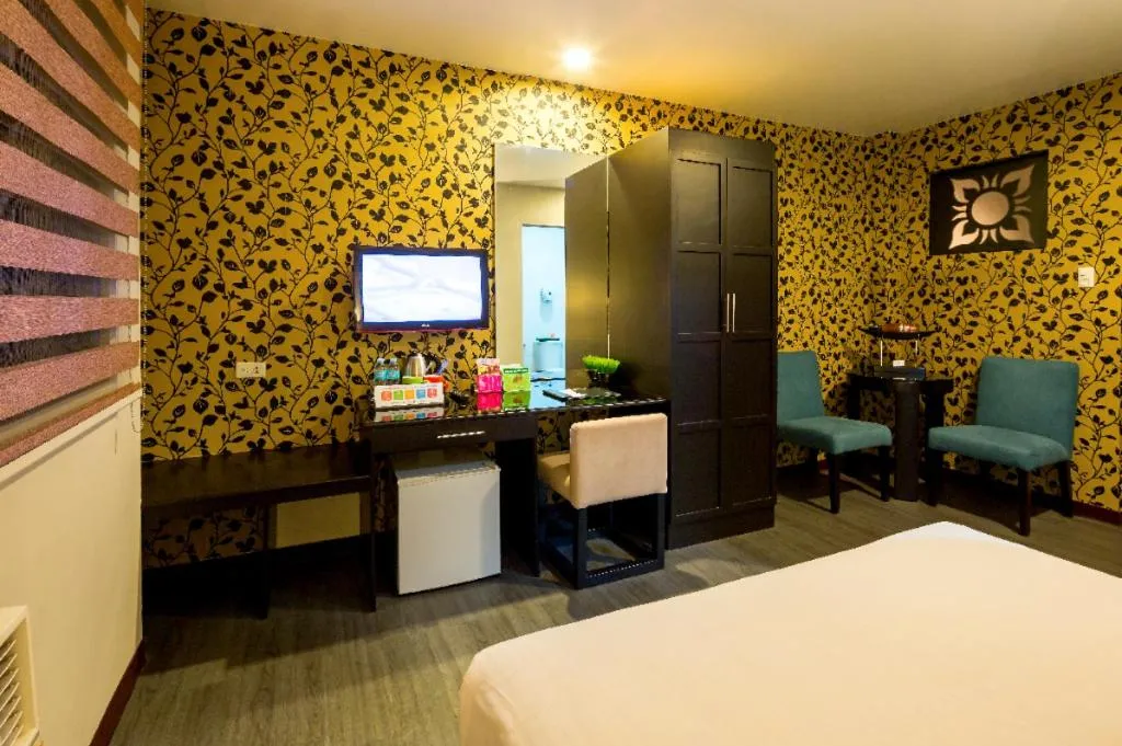 Bed in L Square Hotel