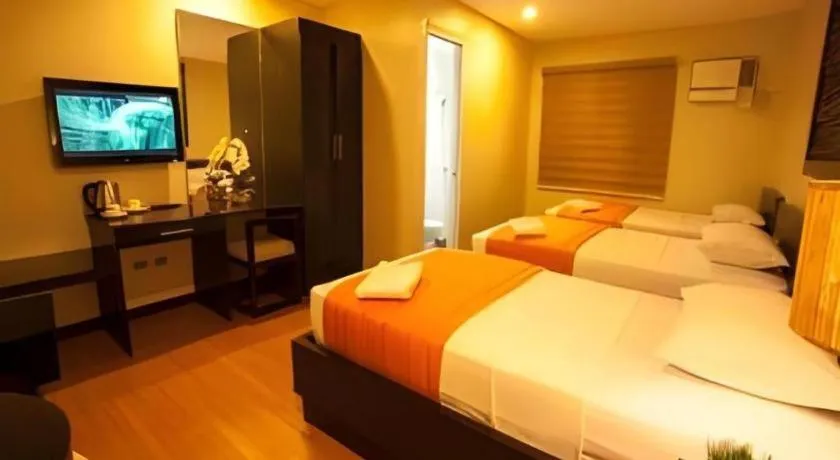 Bed in L Square Hotel