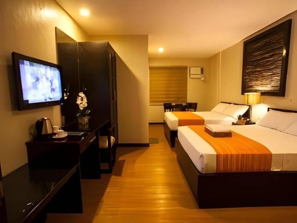 Bed in L Square Hotel