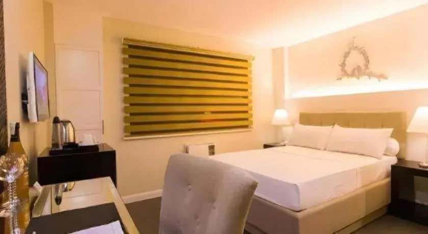 Bed in L Square Hotel Bed in L Square Hotel