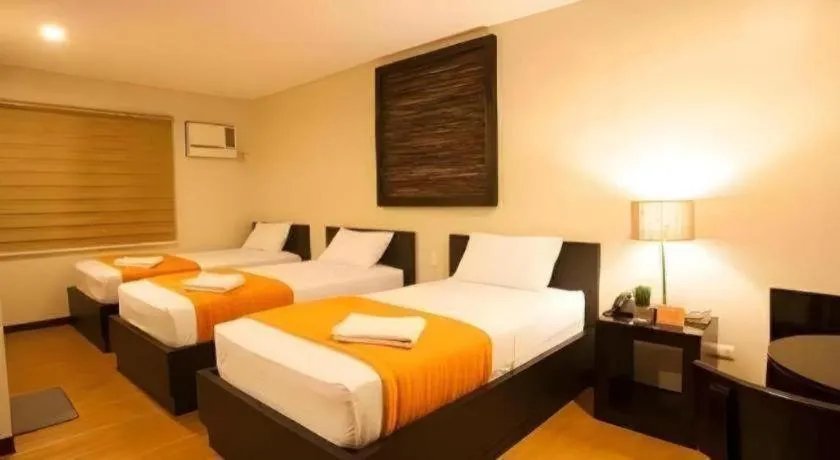 Bed in L Square Hotel