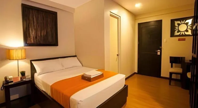 Bed in L Square Hotel