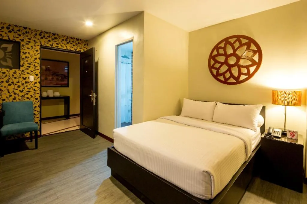 Bed in L Square Hotel