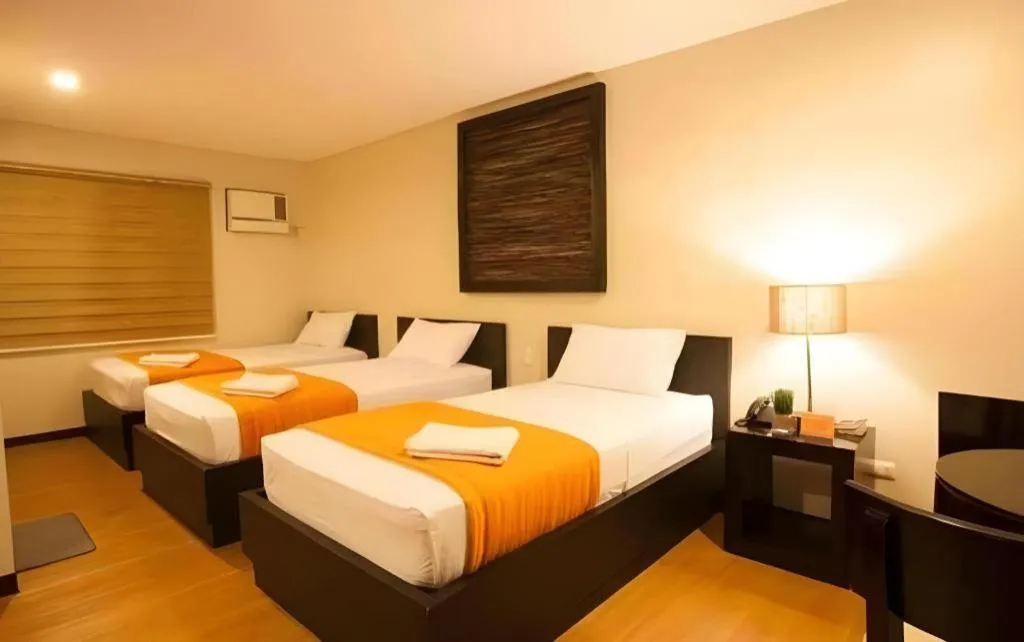 Bed in L Square Hotel