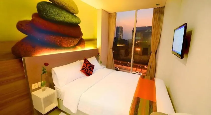 Bed in Clay Hotel Jakarta