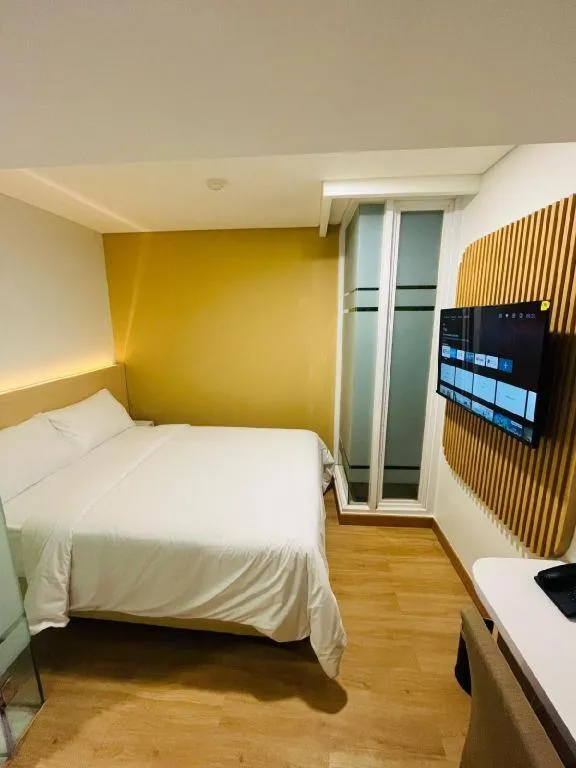 Bed in Clay Hotel Jakarta
