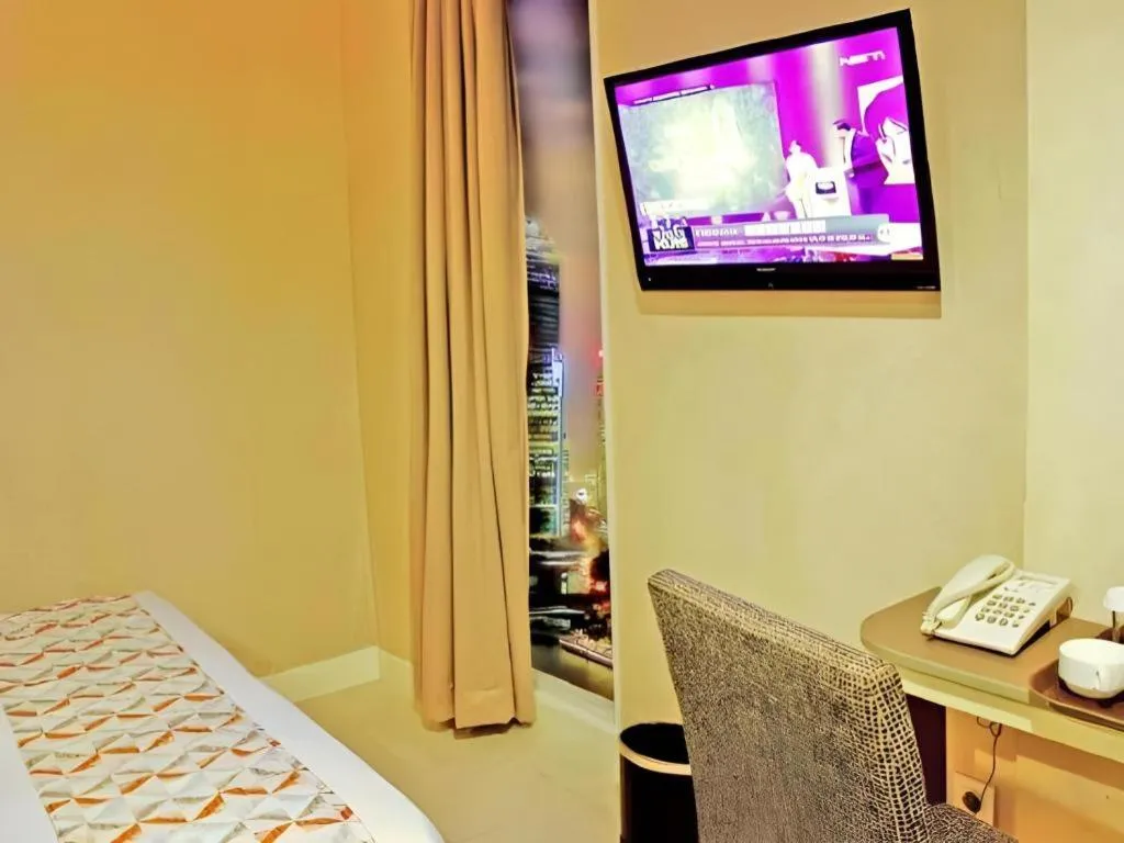 Bed in Clay Hotel Jakarta