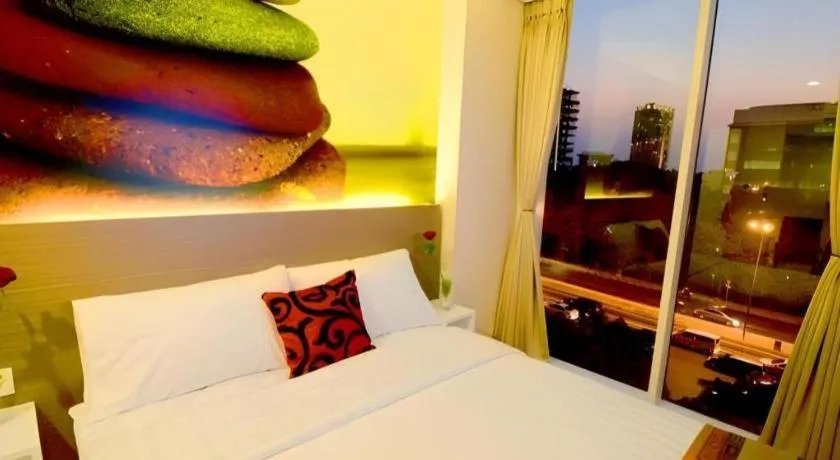 Bed in Clay Hotel Jakarta