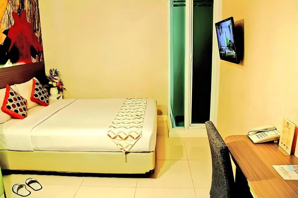 Bed in Clay Hotel Jakarta