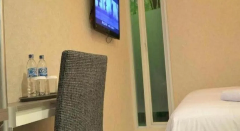 Bed in Clay Hotel Jakarta