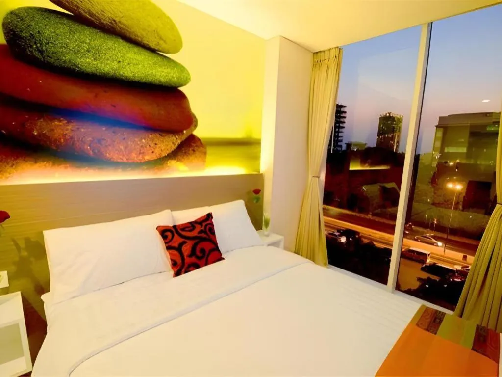 Bed in Clay Hotel Jakarta