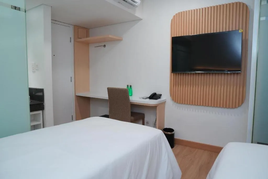 Bed in Clay Hotel Jakarta