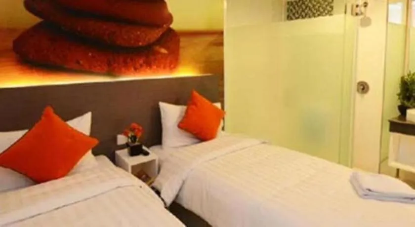 Bed in Clay Hotel Jakarta