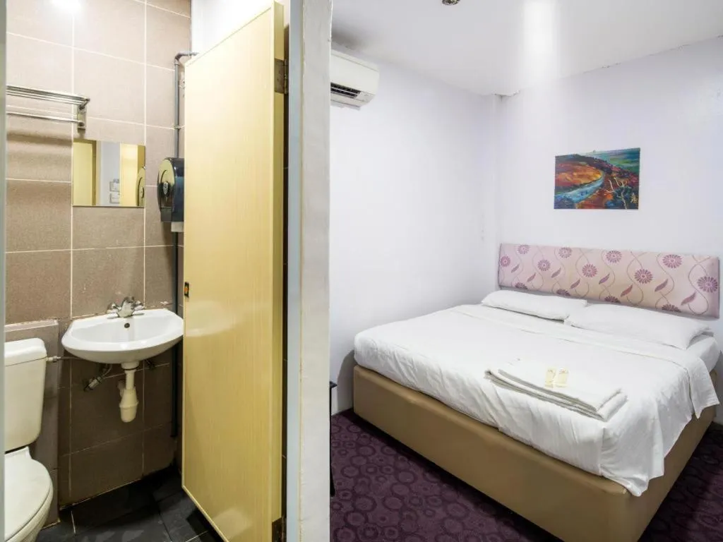 Bed in Meriton Hotel