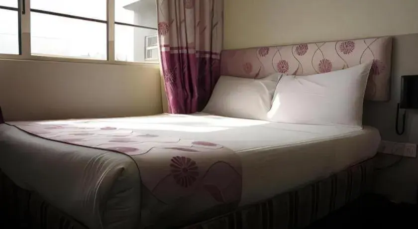 Bed in Meriton Hotel Bed in Meriton Hotel