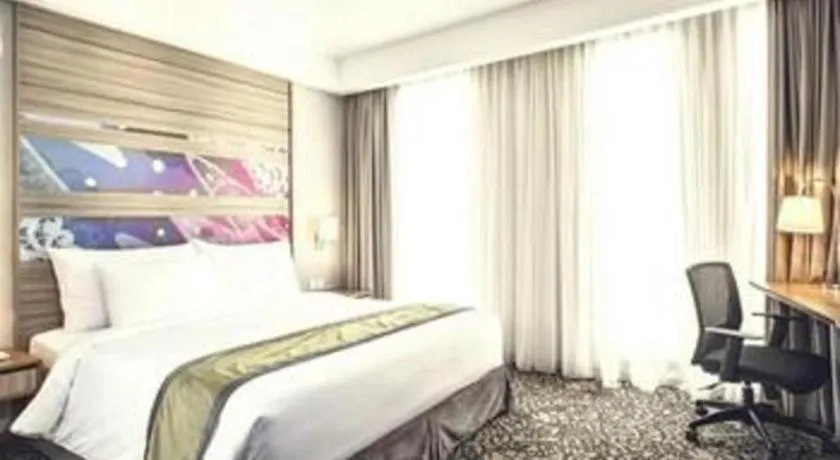 Bed in Hotel GranDhika Iskandarsyah