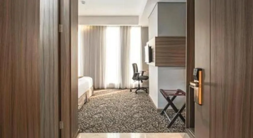 Bed in Hotel GranDhika Iskandarsyah