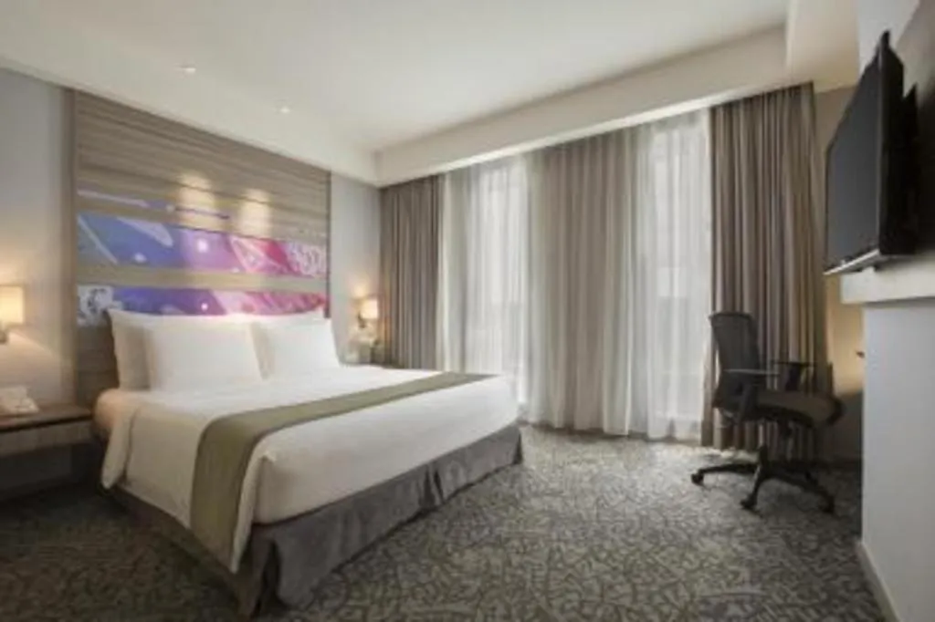 Bed in Hotel GranDhika Iskandarsyah