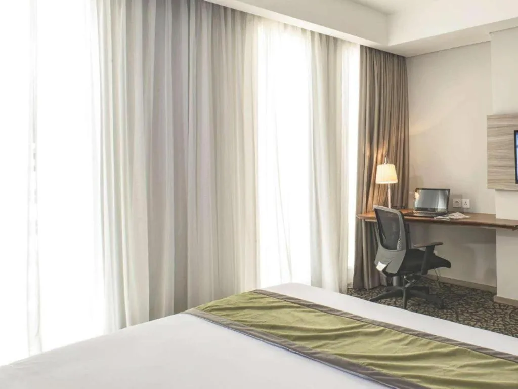 Bed in Hotel GranDhika Iskandarsyah