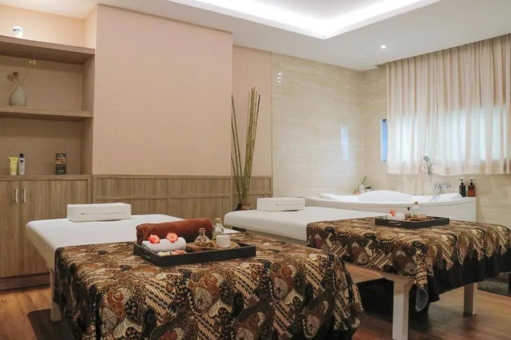 Bed in Hotel GranDhika Iskandarsyah
