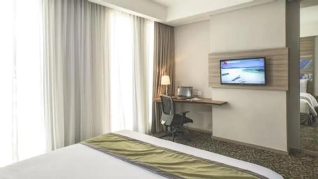 Bed in Hotel GranDhika Iskandarsyah