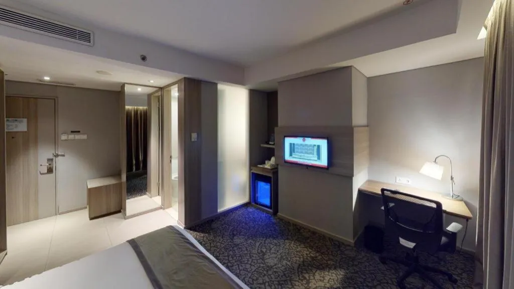 Bed in Hotel GranDhika Iskandarsyah