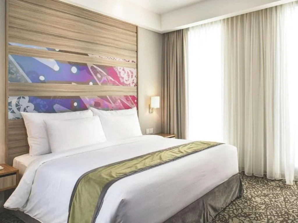 Bed in Hotel GranDhika Iskandarsyah