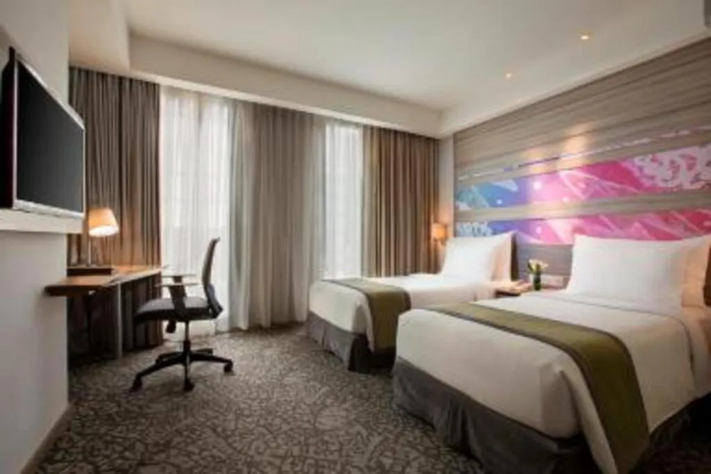 Bed in Hotel GranDhika Iskandarsyah