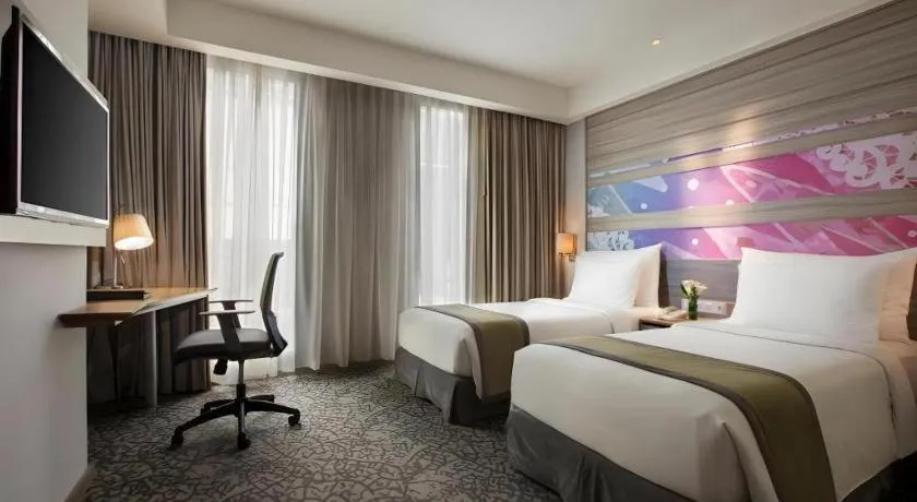 Bed in Hotel GranDhika Iskandarsyah