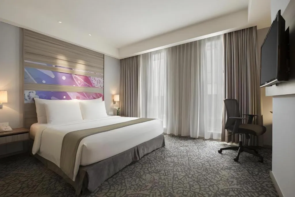 Bed in Hotel GranDhika Iskandarsyah