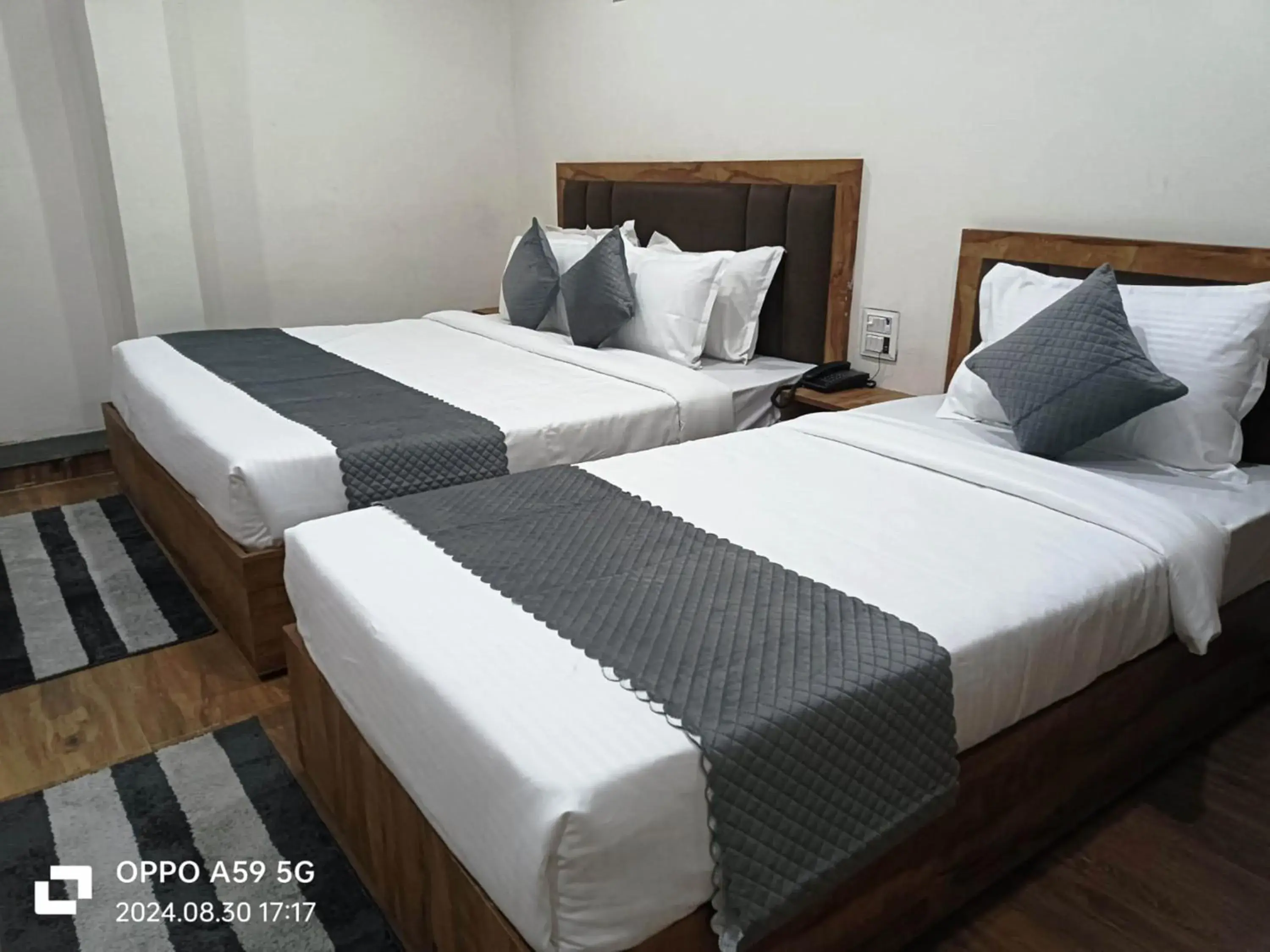 Bed in ShriGo Hotel Pushpa Residency Bed in ShriGo Hotel Pushpa Residency