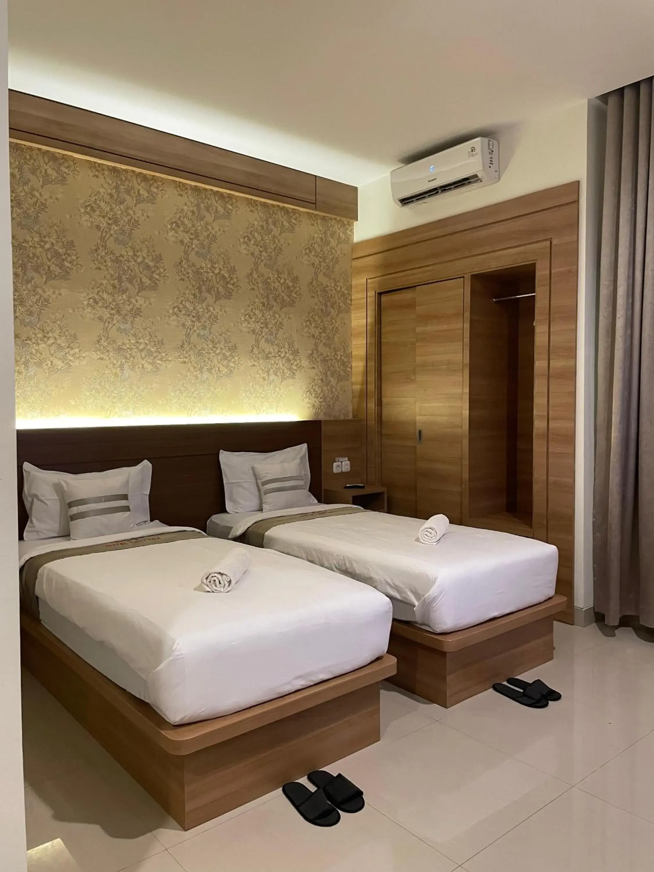 Bed in Hotel Cendana Palu Bed in Hotel Cendana Palu