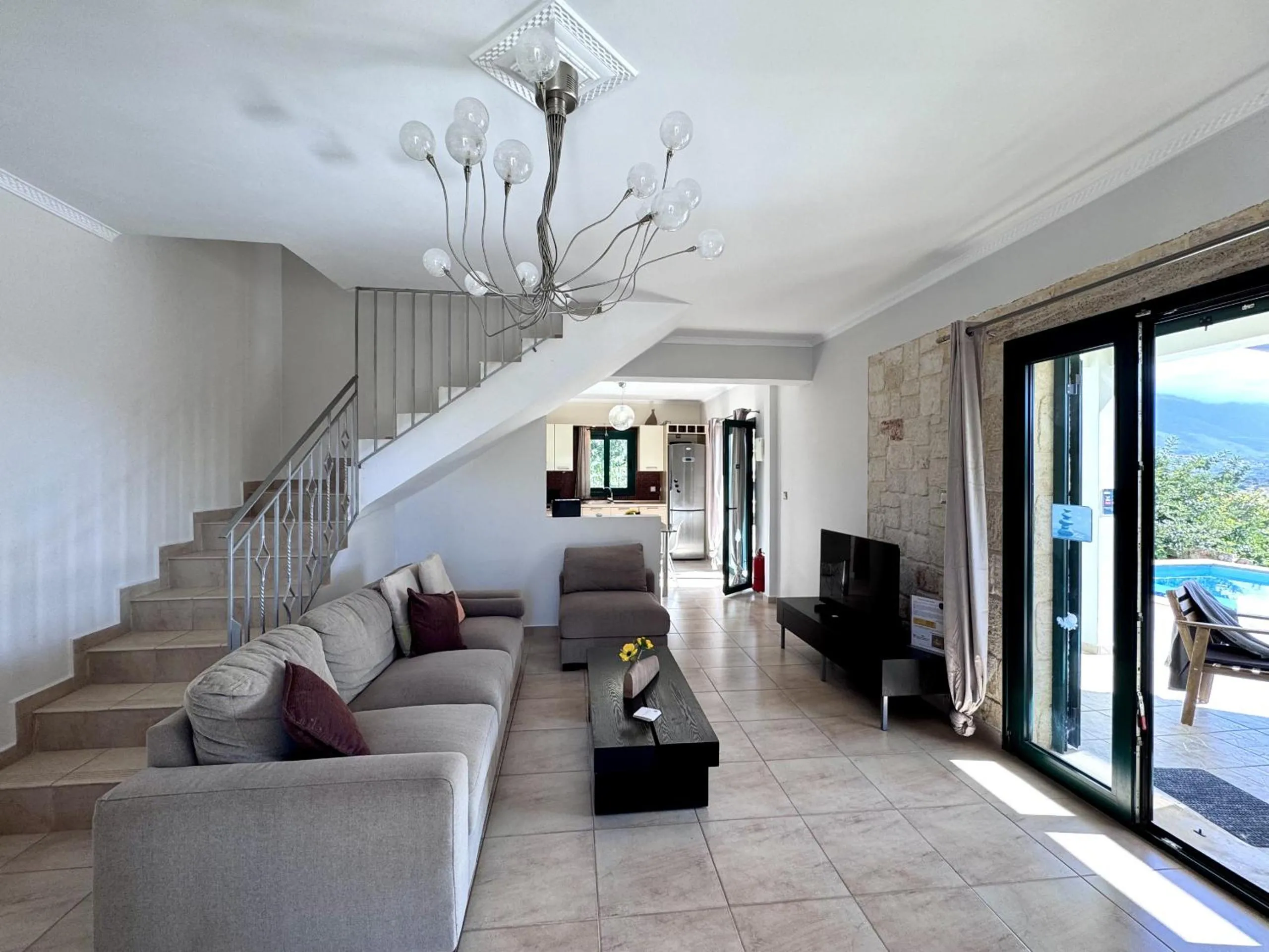 Communal lounge/ TV room in Villa Yianna