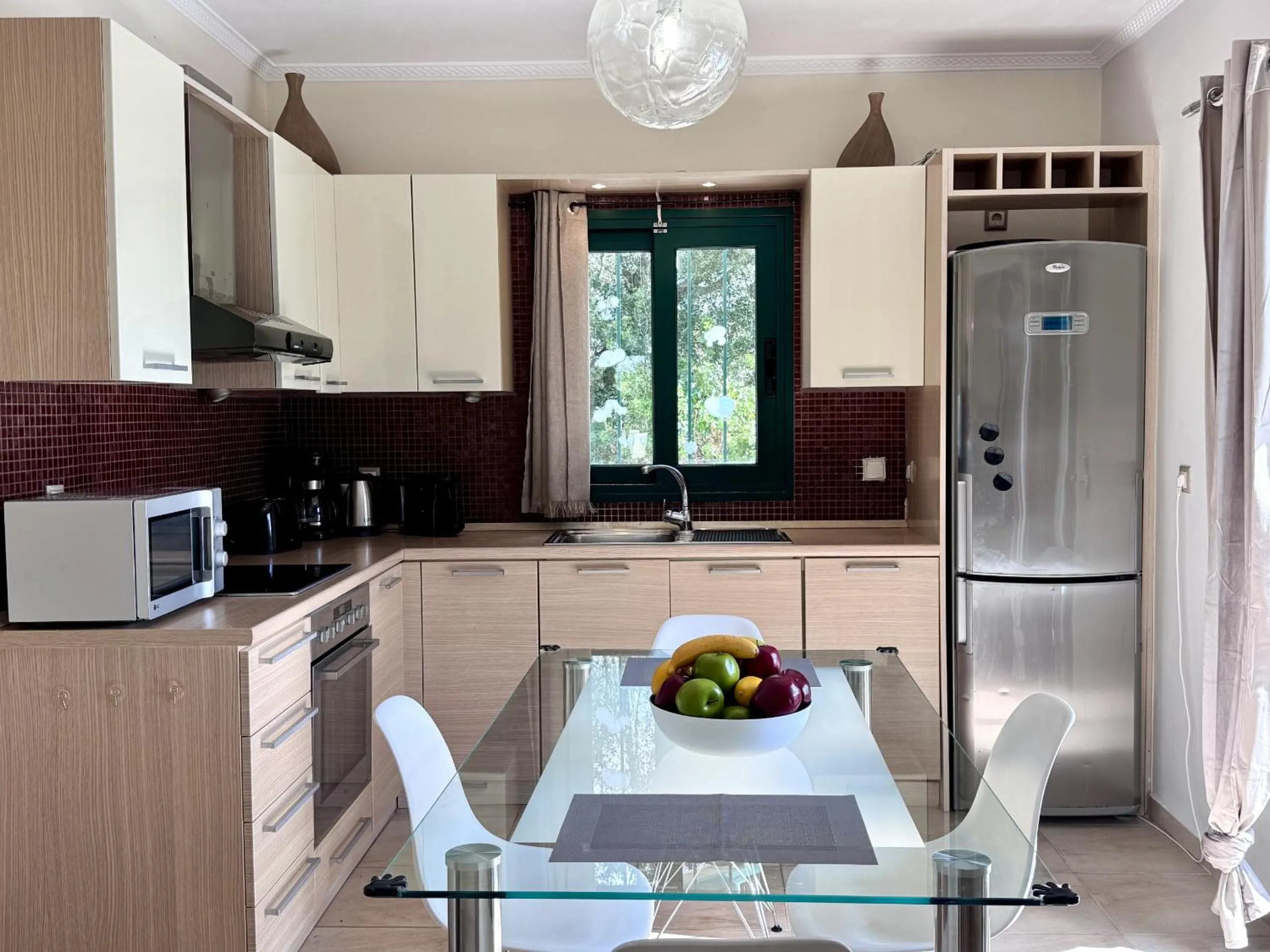 Kitchen or kitchenette in Villa Yianna