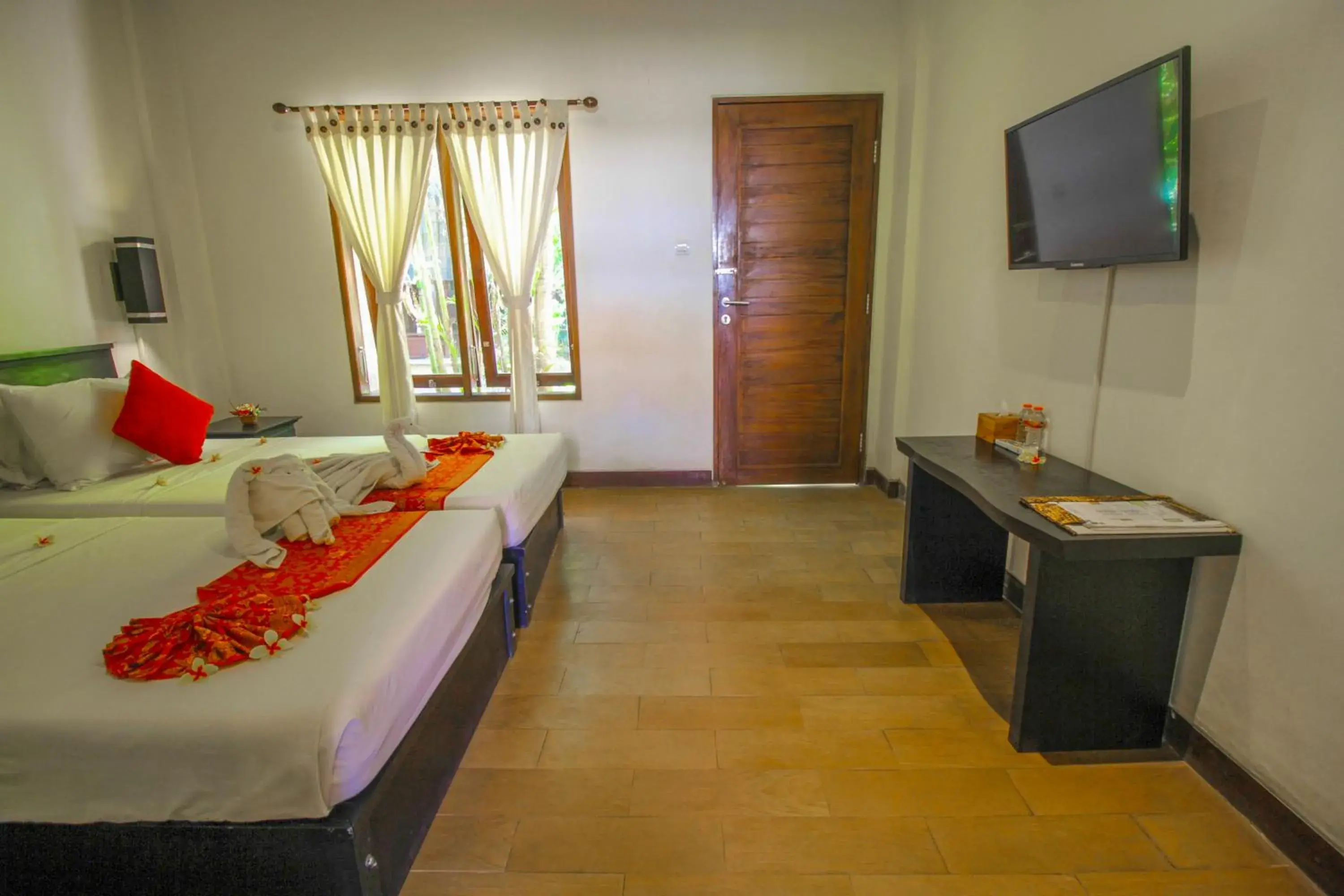 TV and multimedia, Bed in The Galuh Pekutatan TV and multimedia, Bed in The Galuh Pekutatan